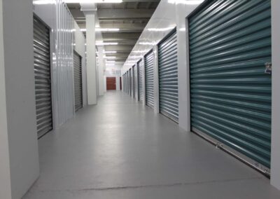 Clean indoor hallway with climate controlled self storage units in Axton, VA.