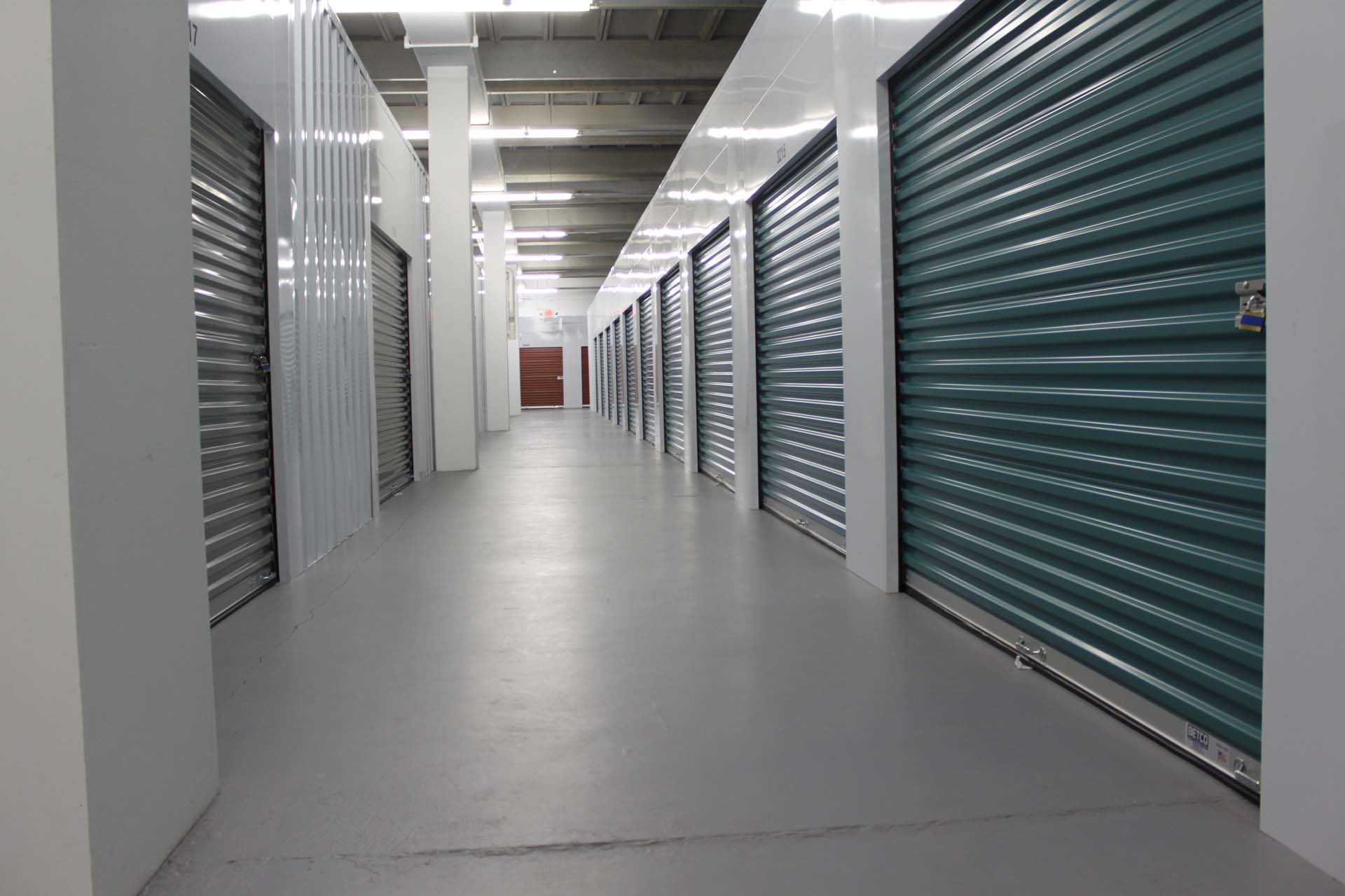 Clean indoor hallway with climate controlled self storage units in Axton, VA.